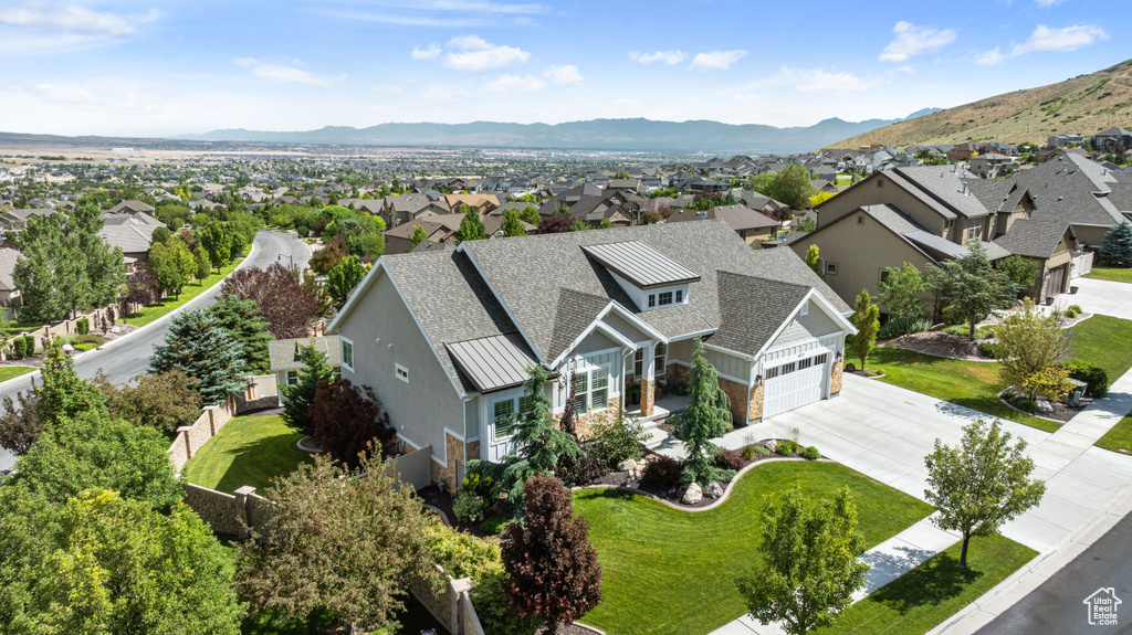 Aerial perspective of suburban area featuring mountains