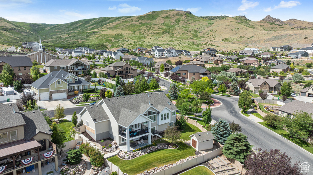 Aerial perspective of suburban area with mountains