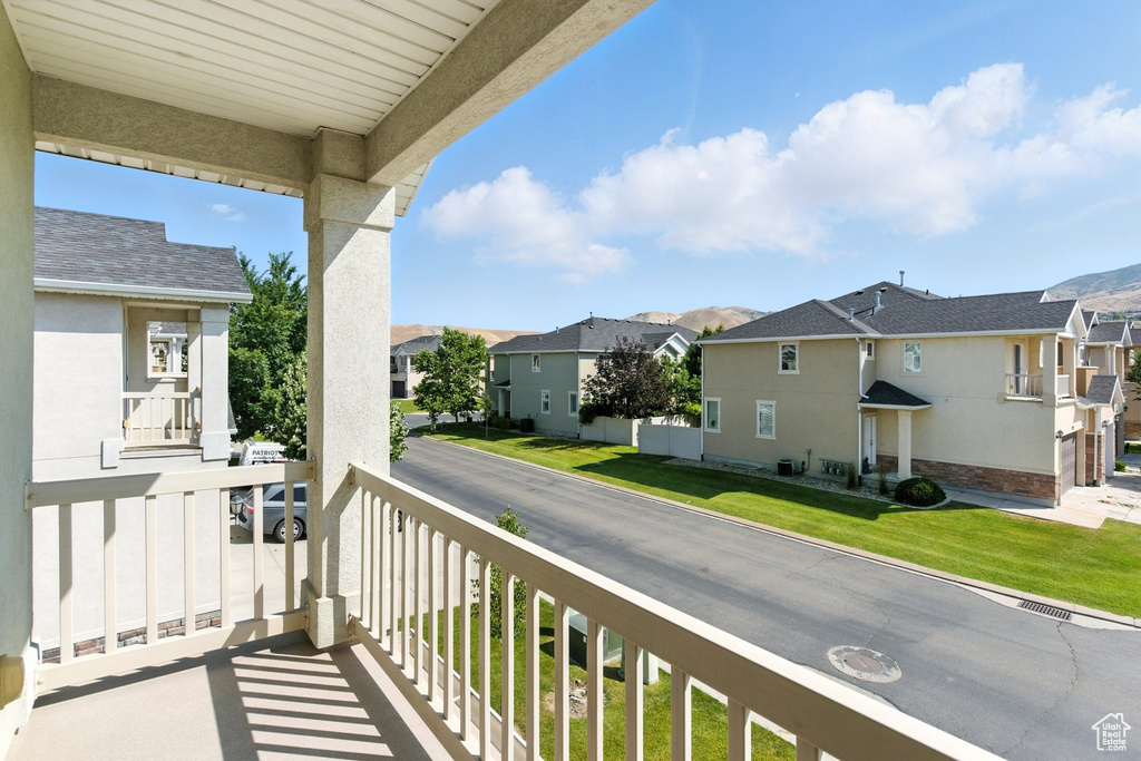 Balcony featuring a residential view