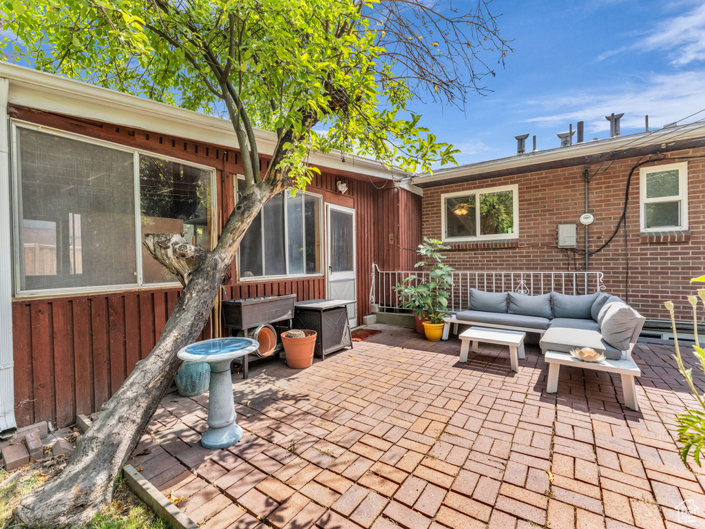 View of patio featuring an outdoor living space