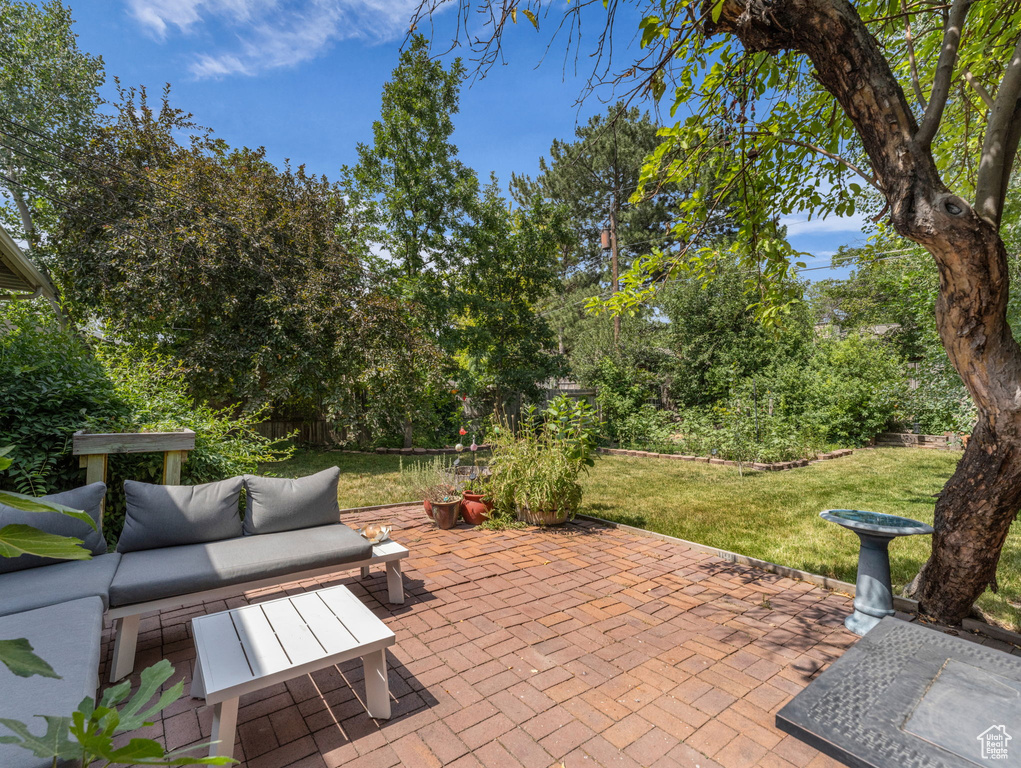 View of patio with outdoor lounge area
