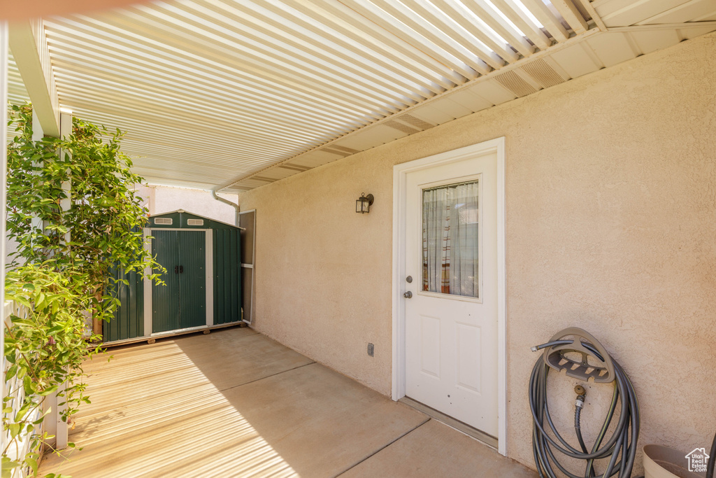 Wooden terrace with a storage unit