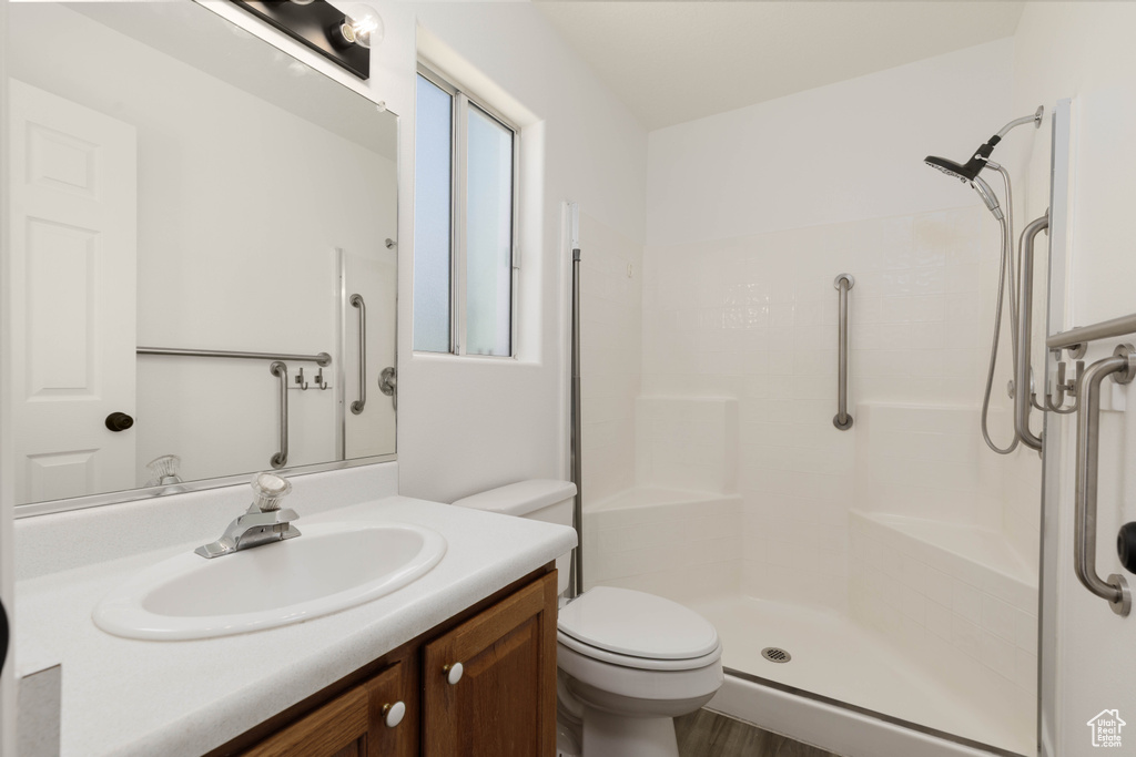 Bathroom with a walk in shower and vanity