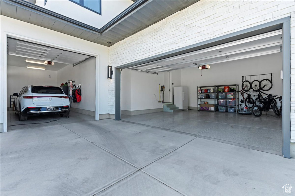 Garage featuring a garage door opener