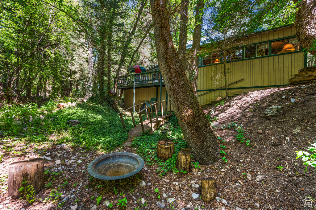 View of yard with a deck