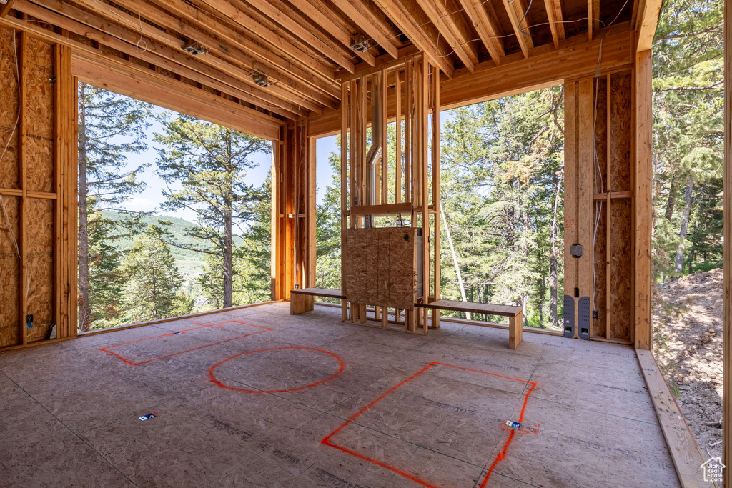 Unfurnished sunroom with healthy amount of natural light