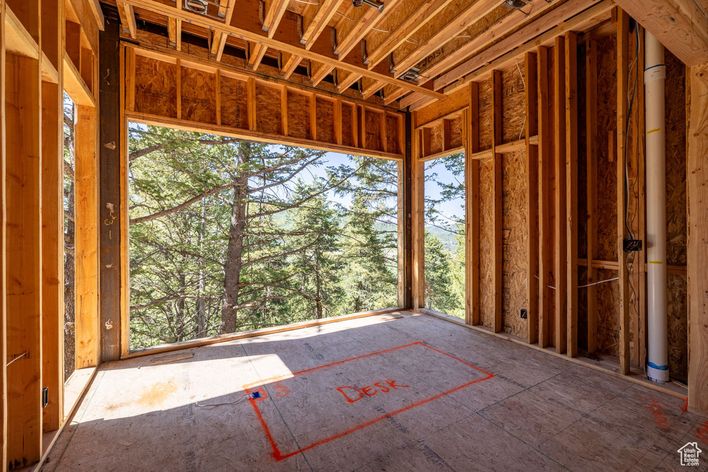 Unfurnished sunroom with healthy amount of natural light