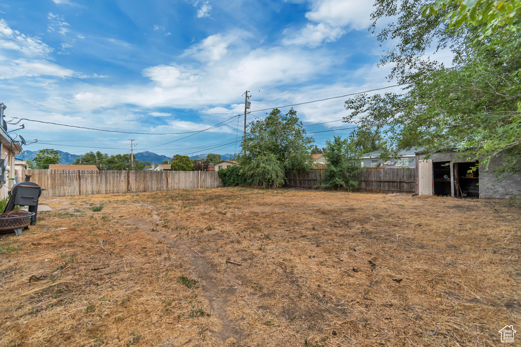 View of fenced backyard
