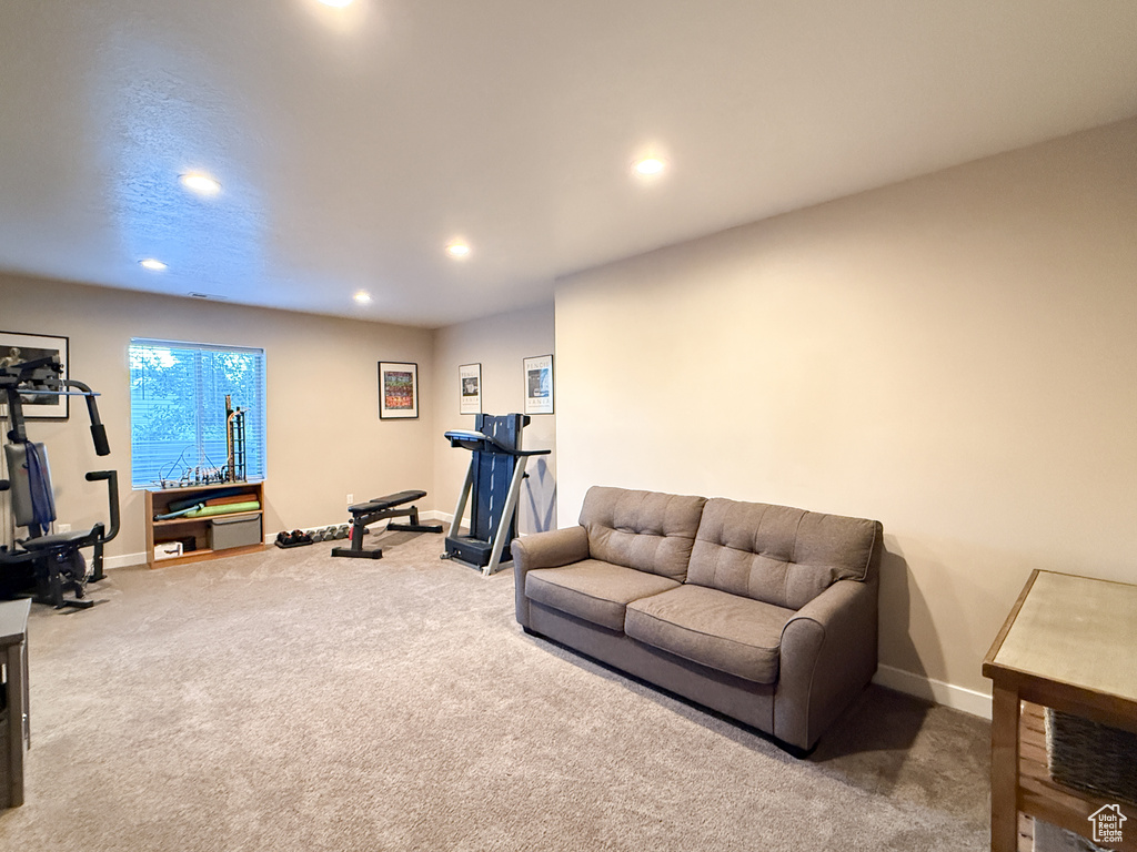 Exercise area with recessed lighting and carpet floors