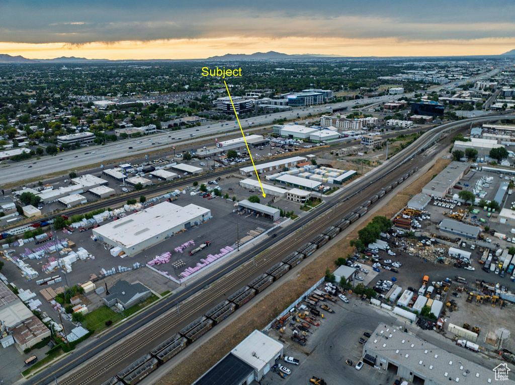View of property location featuring a major roadway and mountains