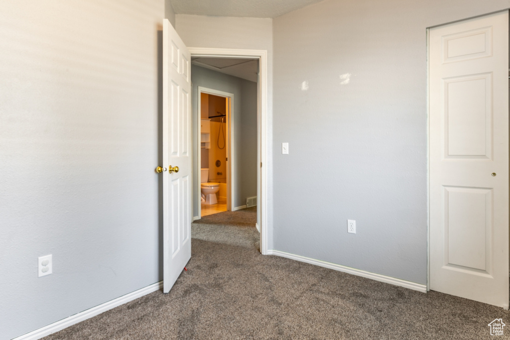 Spare room with carpet flooring and baseboards