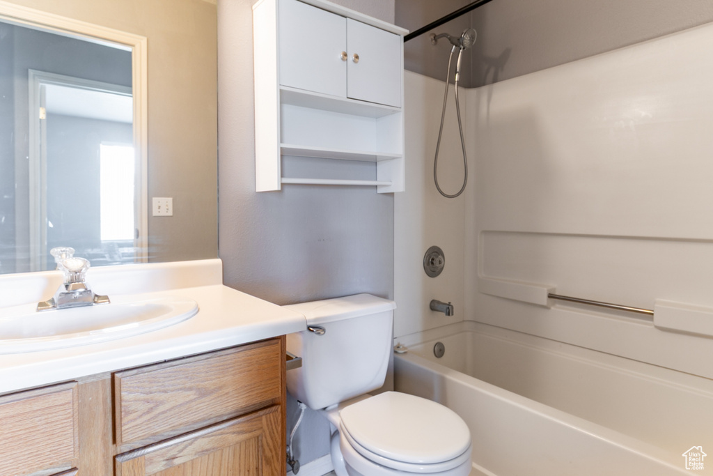 Bathroom featuring vanity and shower / bath combination