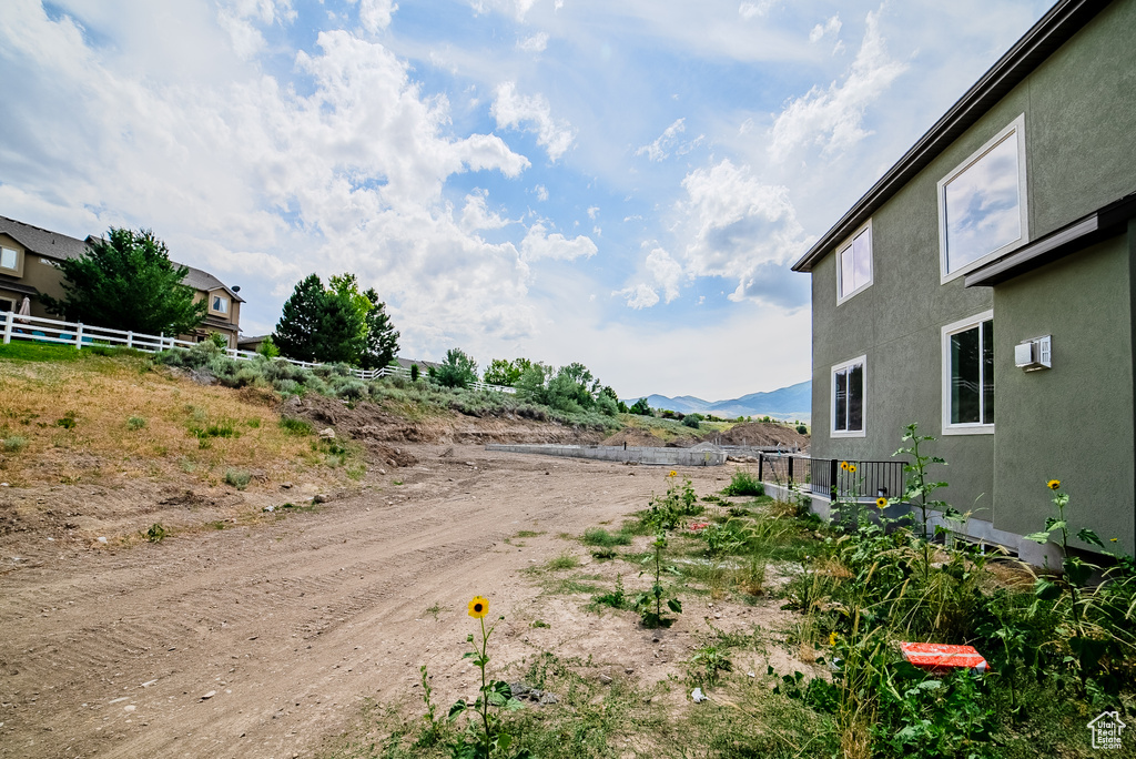 View of yard with a mountain view