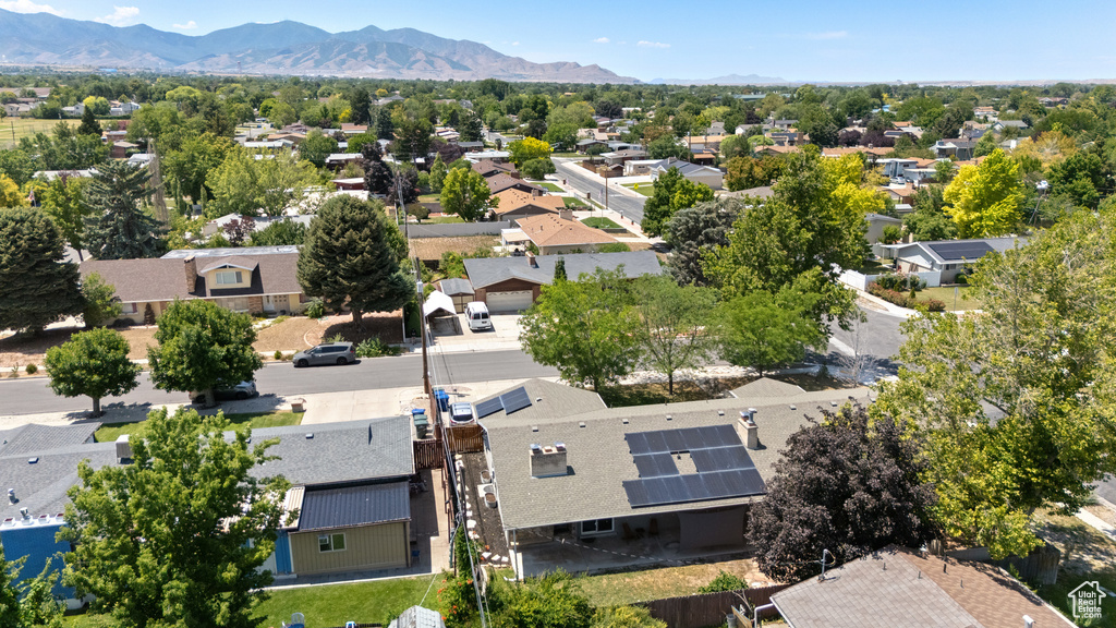 Aerial view of residential area with a mountainous background