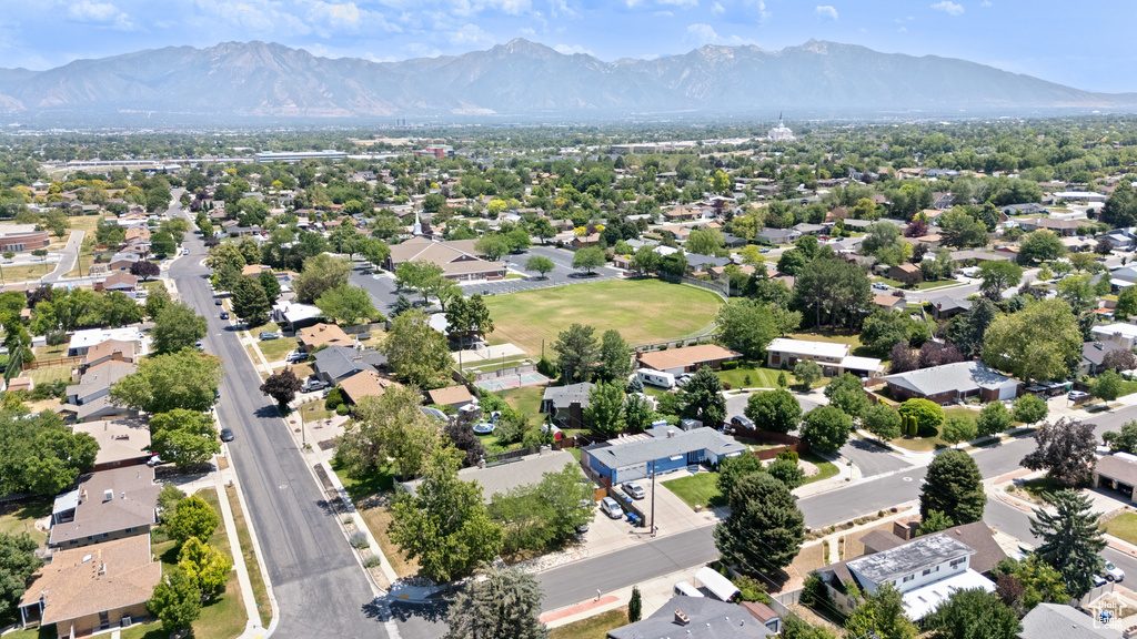 Aerial view of residential area with a mountain backdrop