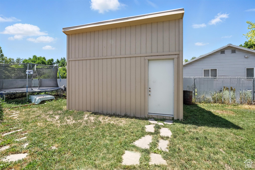 View of shed featuring a trampoline