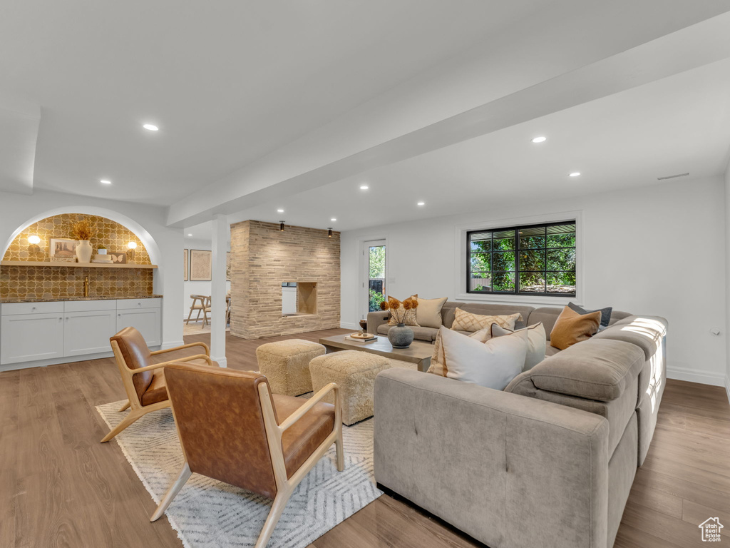 Living room featuring recessed lighting and light wood-style floors
