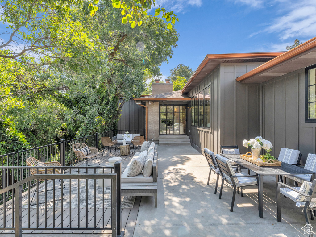 View of patio / terrace with outdoor dining area and outdoor lounge area