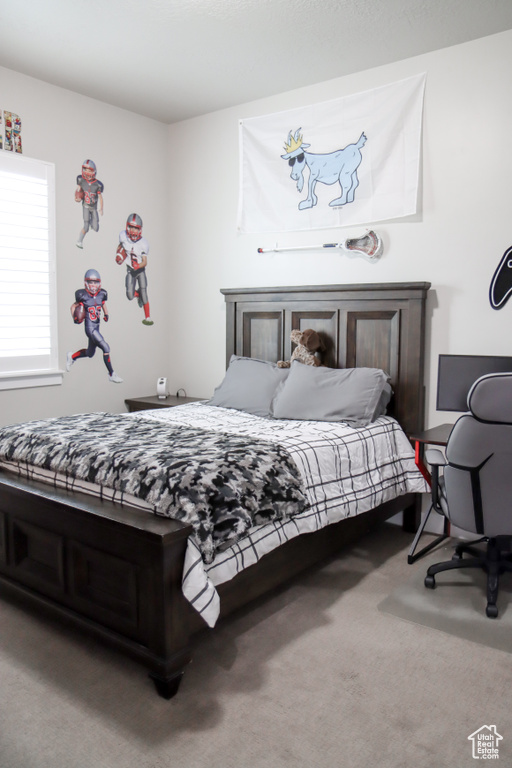 View of carpeted bedroom