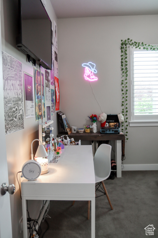 Home office featuring carpet