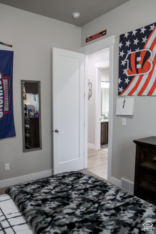 Bedroom featuring baseboards