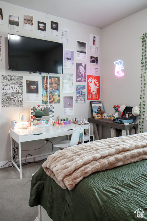 Bedroom featuring carpet floors