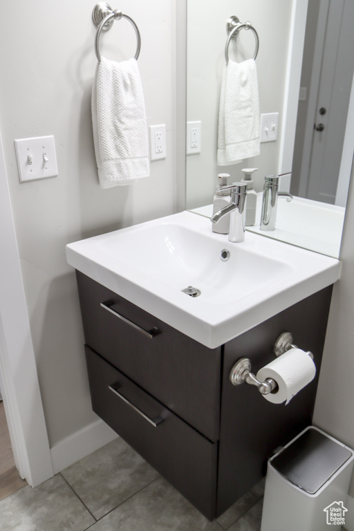 Bathroom with vanity and tile patterned floors