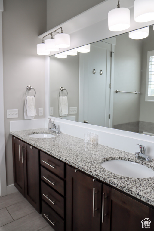 Bathroom featuring double vanity