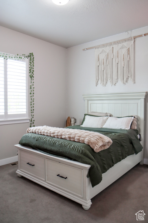 Bedroom featuring carpet flooring