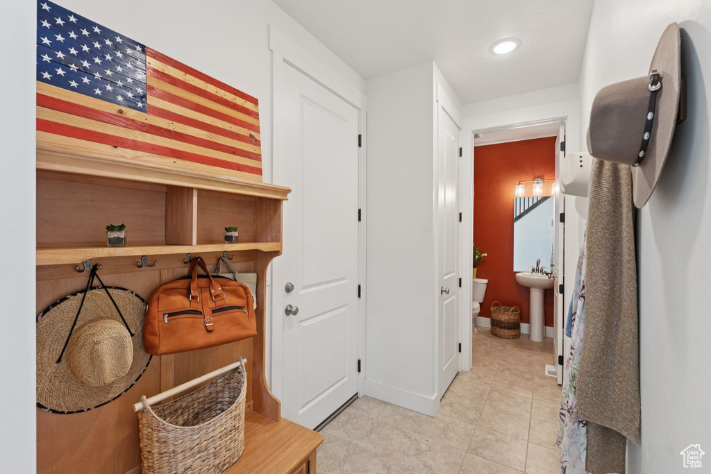Mudroom featuring light tile patterned floors and recessed lighting