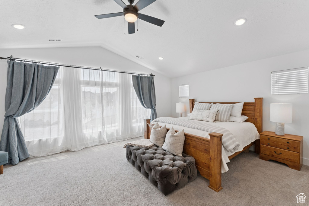 Bedroom featuring lofted ceiling, carpet, ceiling fan, and recessed lighting