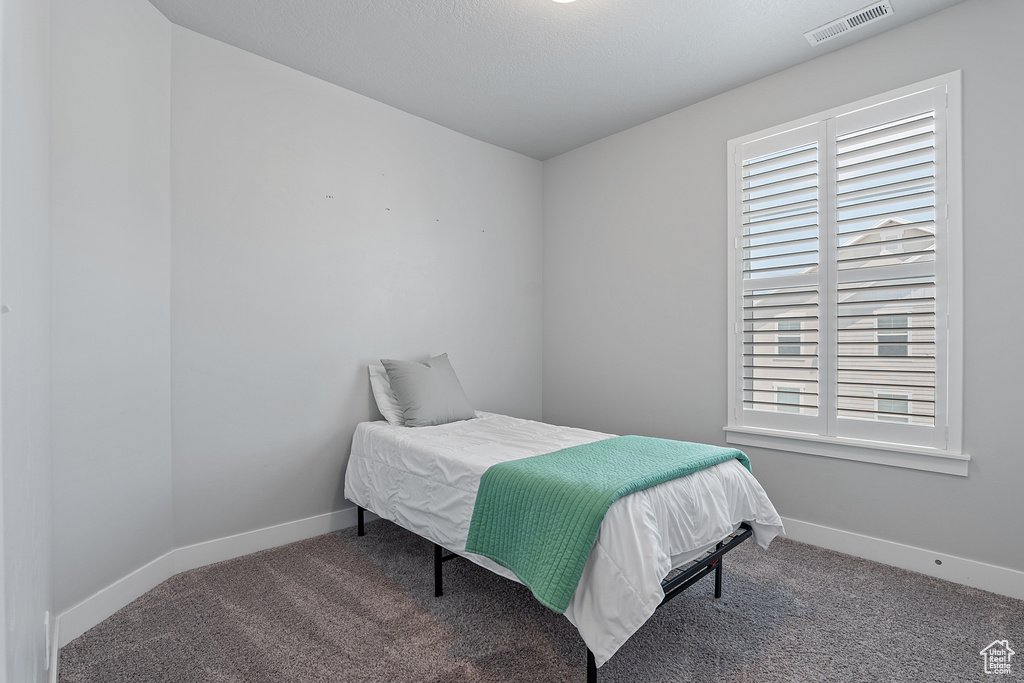 Bedroom with carpet floors