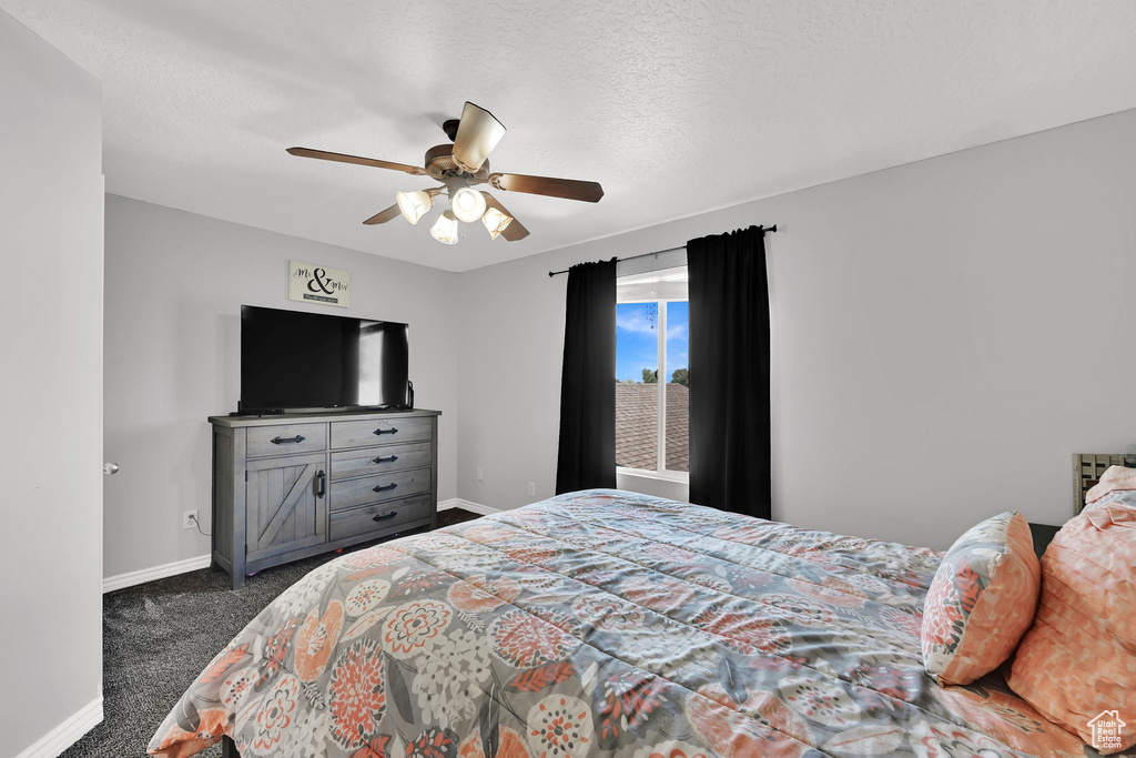 Bedroom featuring carpet floors and ceiling fan