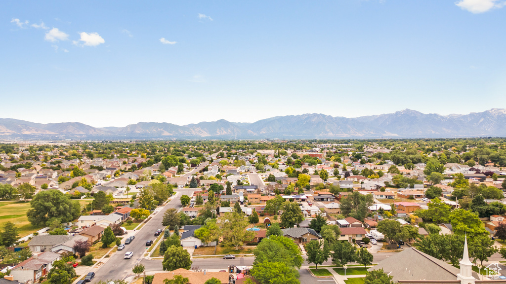 Aerial perspective of suburban area with mountains
