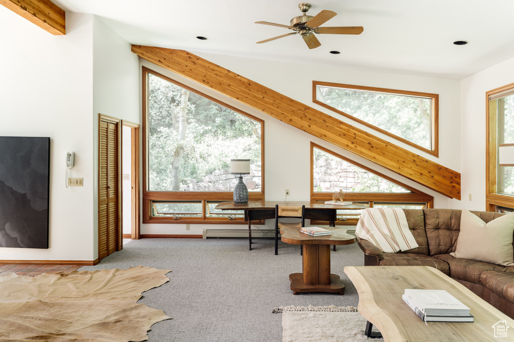 Living area featuring baseboard heating, ceiling fan, recessed lighting, and carpet flooring