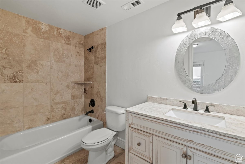 Full bathroom with vanity,  shower combination, and tile patterned flooring