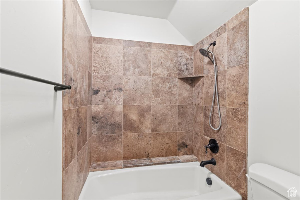 Bathroom with toilet and shower / washtub combination