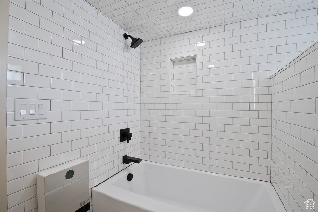 Bathroom with bathing tub / shower combination