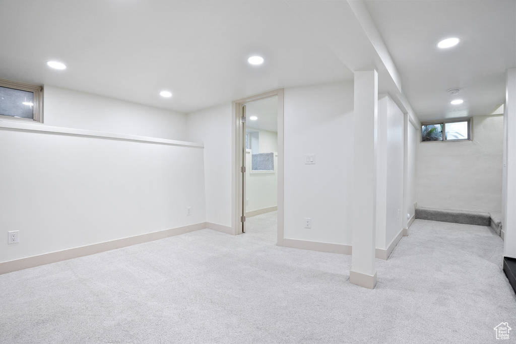 Basement with carpet and recessed lighting