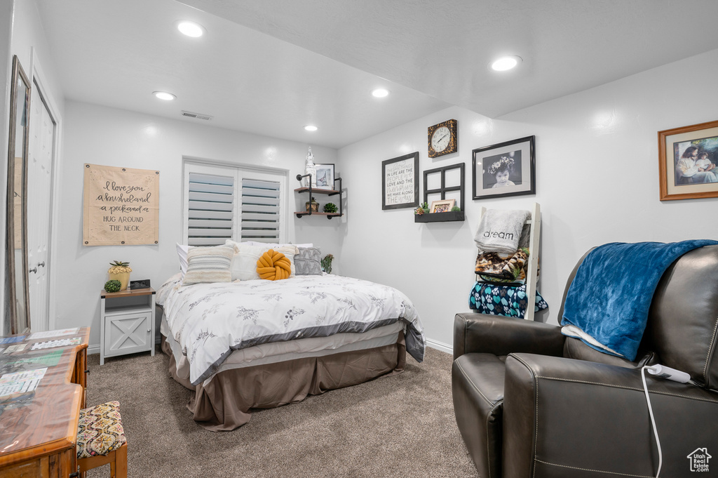 Bedroom with carpet floors and recessed lighting