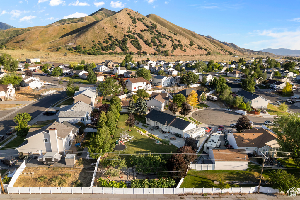 Aerial view of residential area with a mountainous background