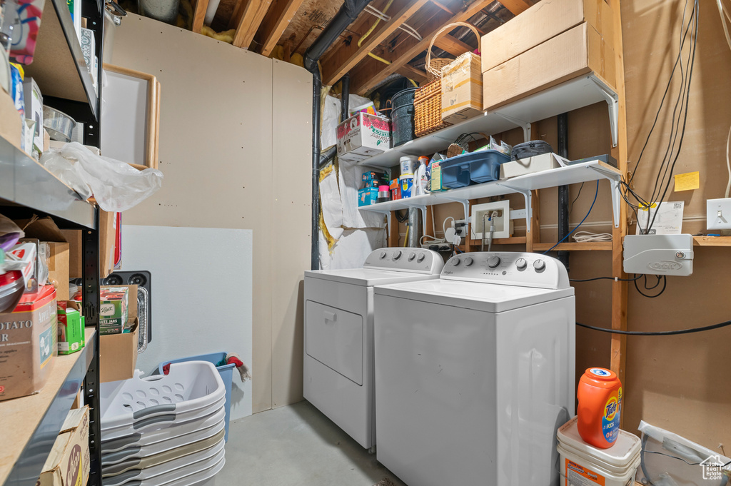 Laundry room featuring independent washer and dryer