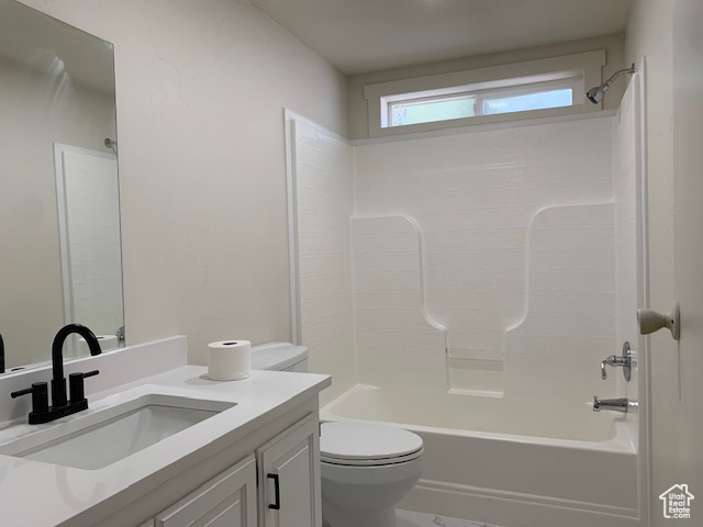 Full bathroom featuring vanity and shower / tub combination