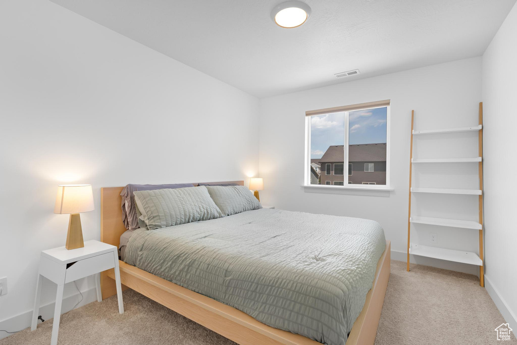 Bedroom featuring carpet