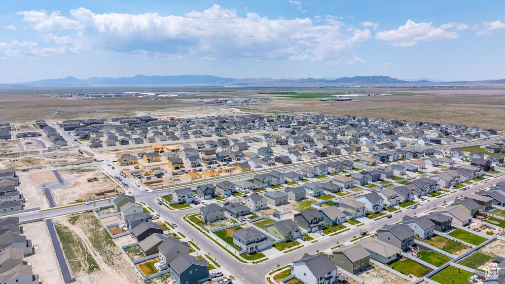 View of property location with a mountainous background and nearby suburban area