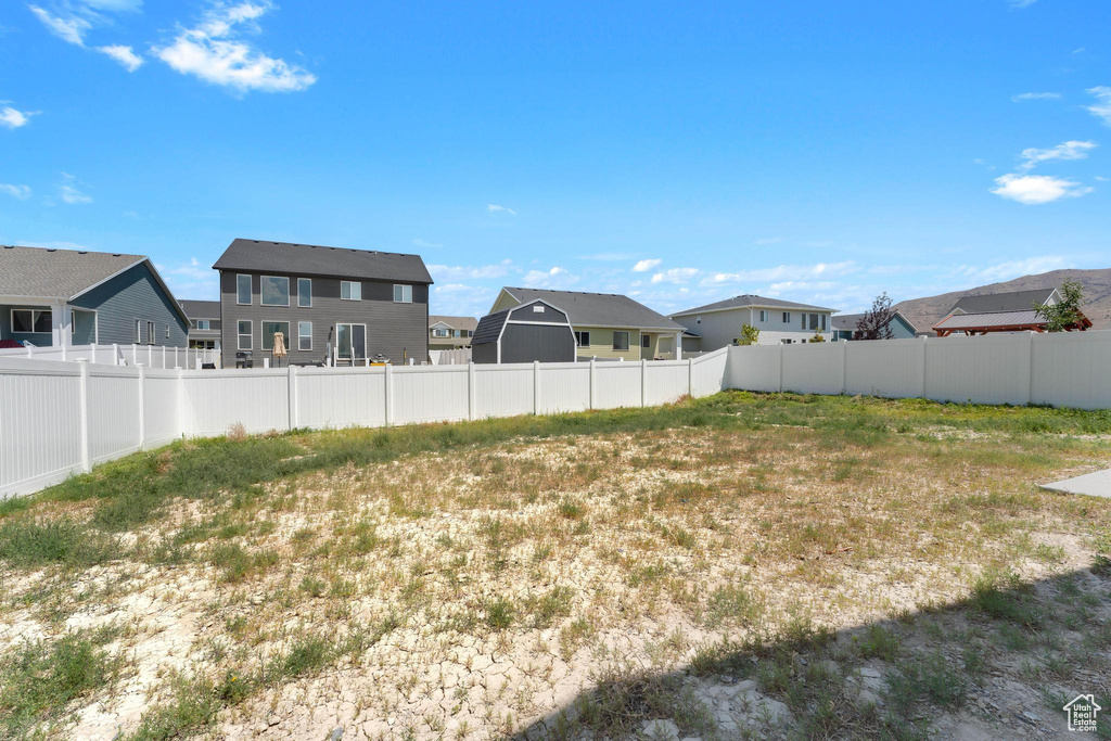 View of yard with a residential view