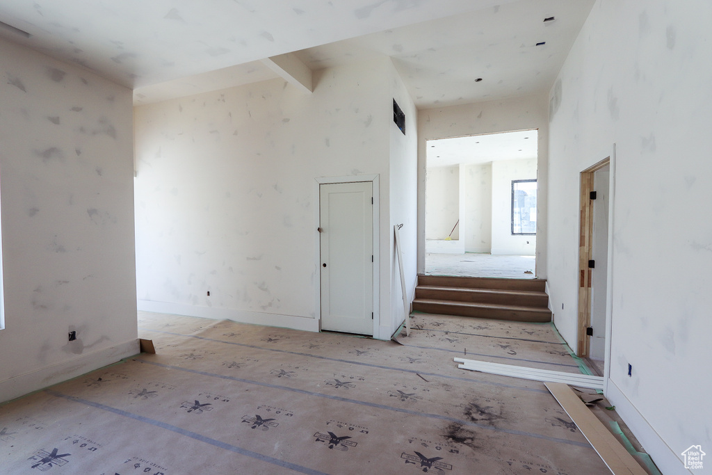 Empty room featuring stairway