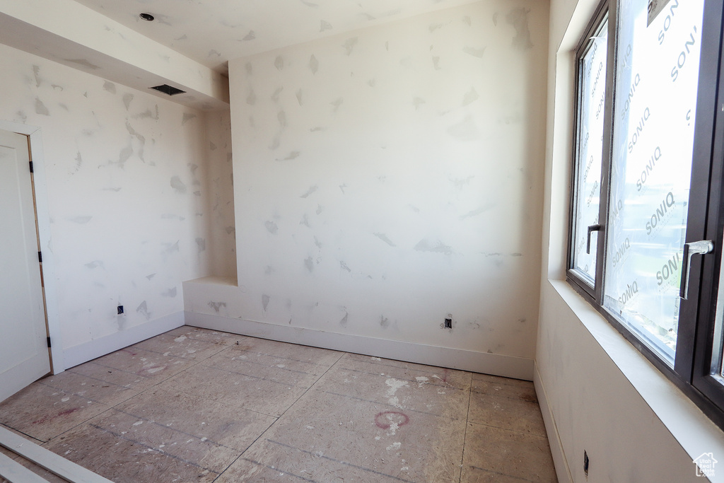 Spare room with baseboards