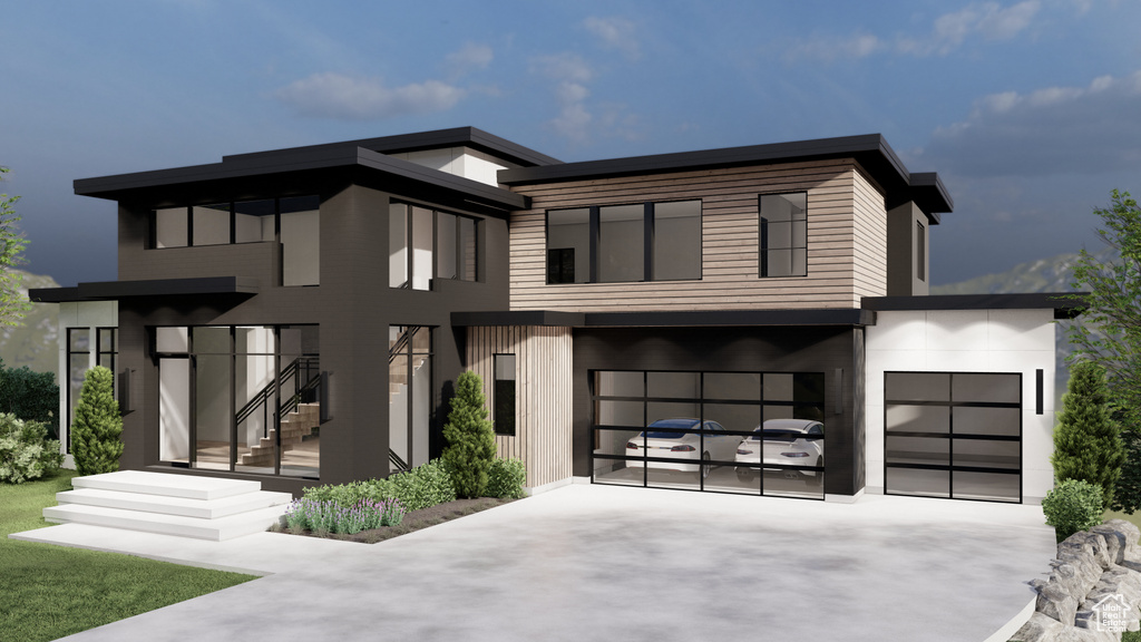 Contemporary house with driveway and a garage