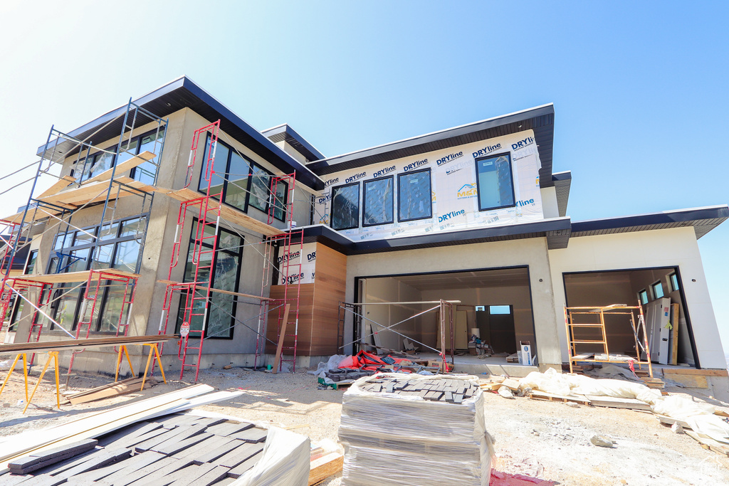 View of front facade with water heater